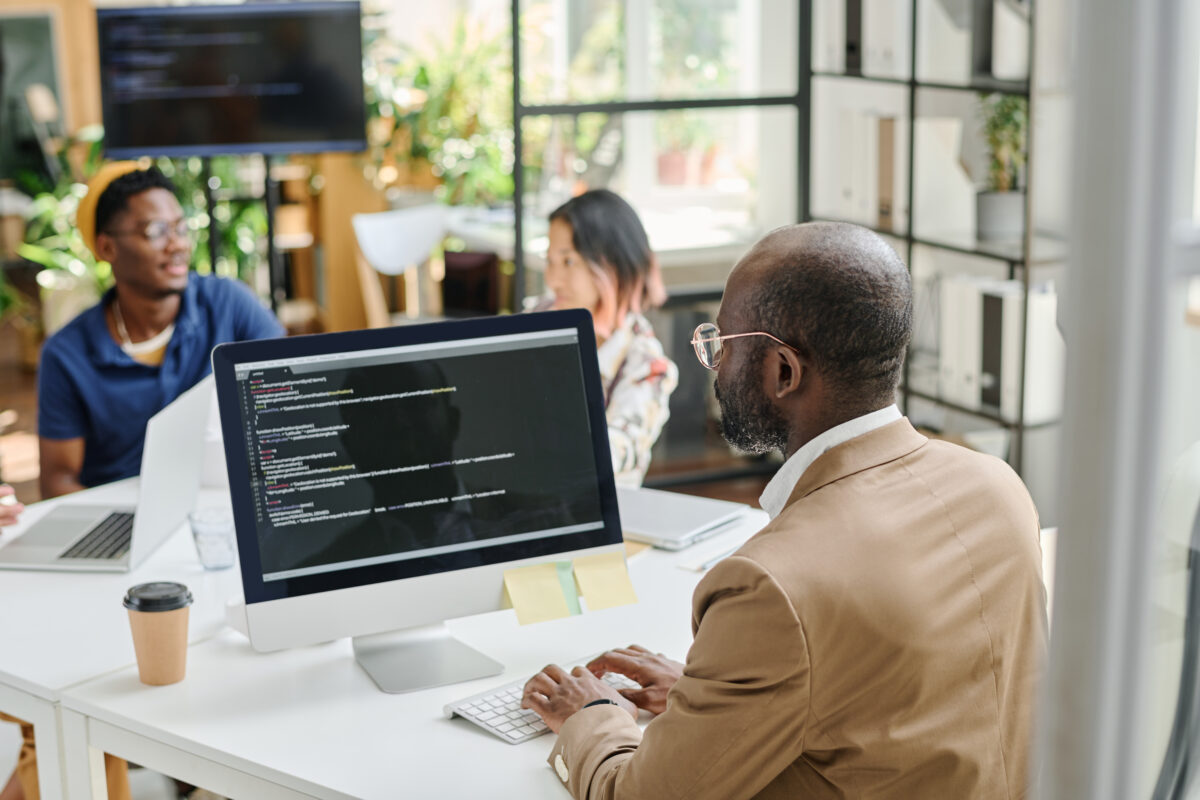 programmer-writing-code-on-computer