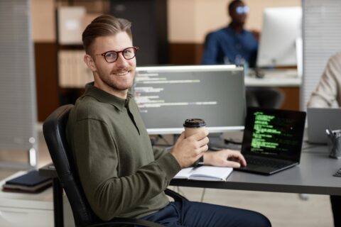 man vibe coding at computer