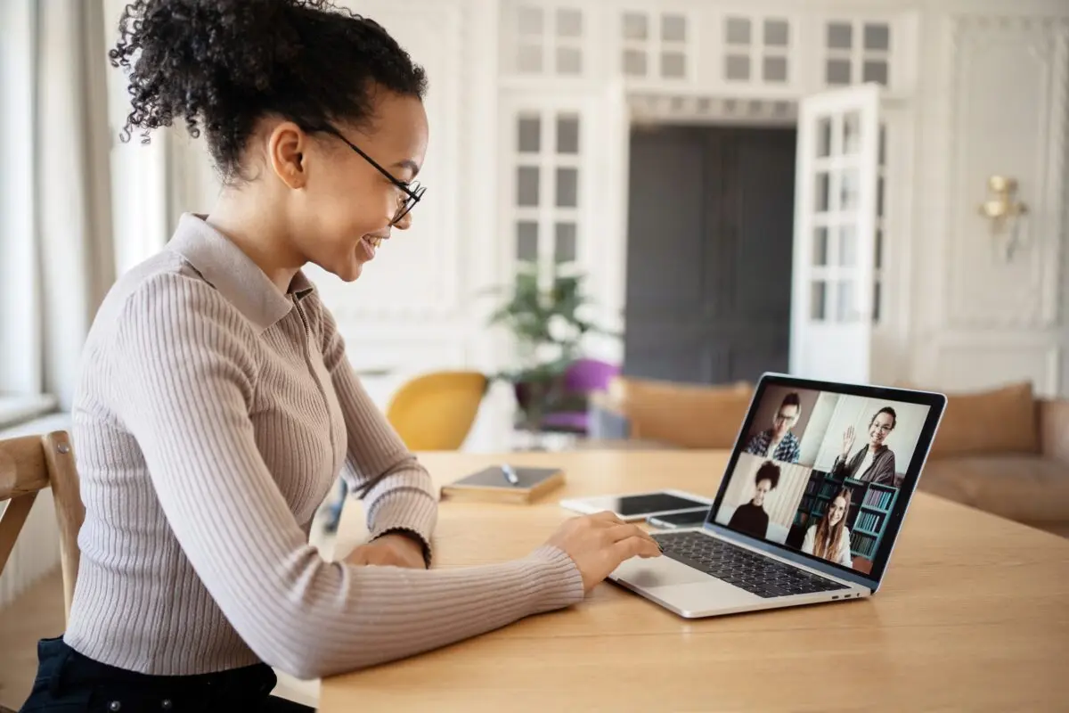 Woman on a video call, networking on a remote coding bootcamp